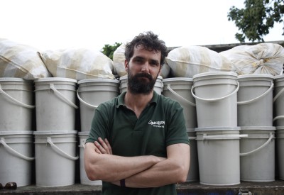Logistics advisor Graham Woodcock in front of a loaded Concern truck with supplies for distribution in La Gonave, Haiti. Photo: Kristin Myers / Concern Worldwide. 