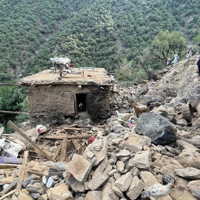 A building surrounded by rubble in Afghanistan.